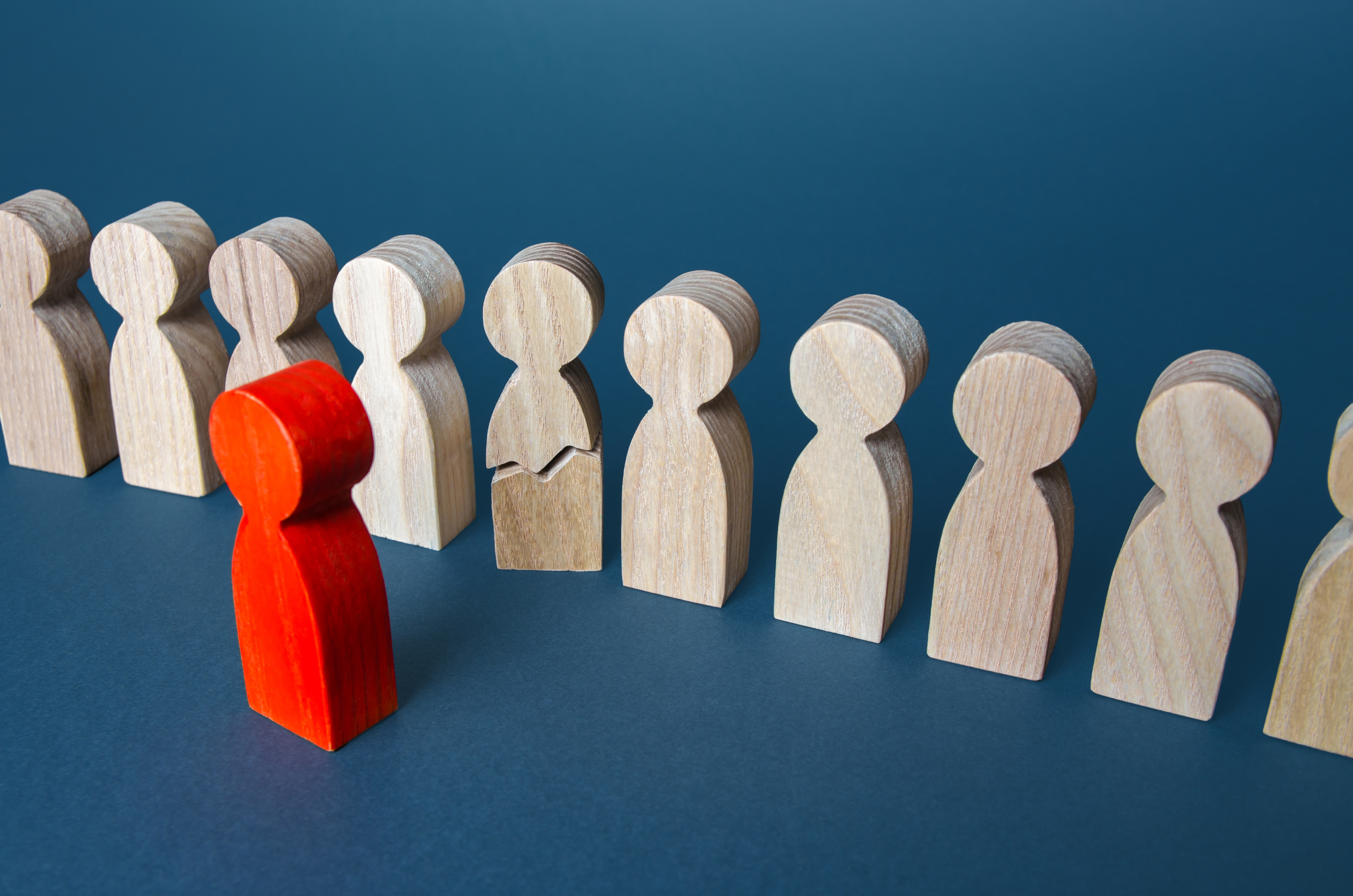 Single person seeking employment in red standing out from the crowd and Staffing Proxy