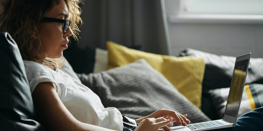 Working from home - woman at home on laptop